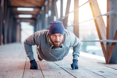 Man doing push-ups outside