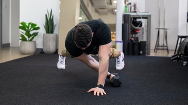 Move 1: High Plank Dumbbell Pull-Through